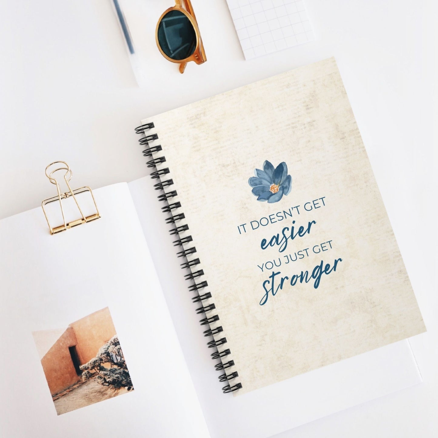 It Doesn't Get Easier You Just Get Stronger Spiral Notebook