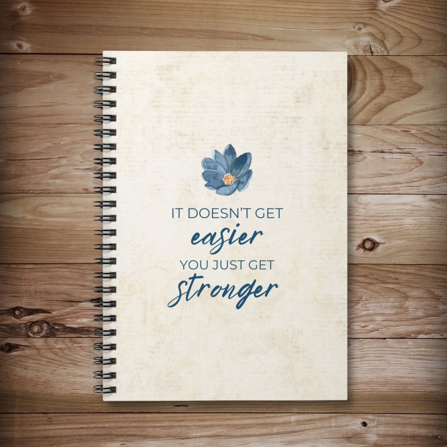 It Doesn't Get Easier You Just Get Stronger Spiral Notebook